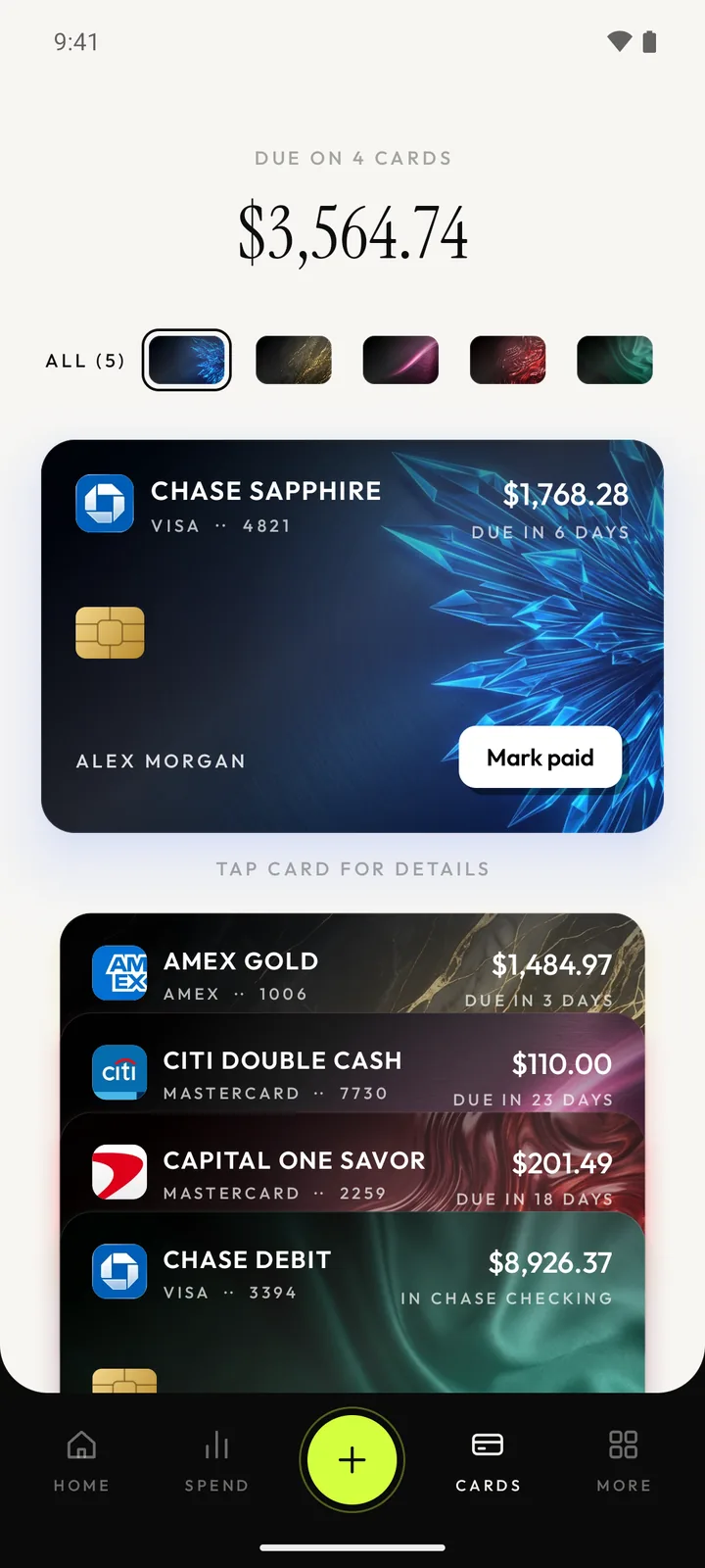 The cards screen: the total due across four cards above a wallet-style stack of credit and debit cards with their amounts and due dates.